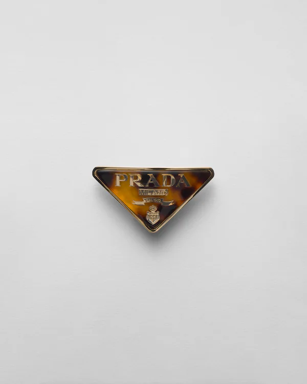 Plexiglas- och metallhårklämma